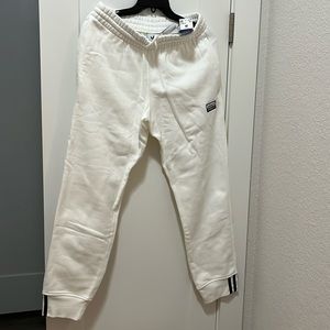 Men adidas sweatpants. New with tag. Size M